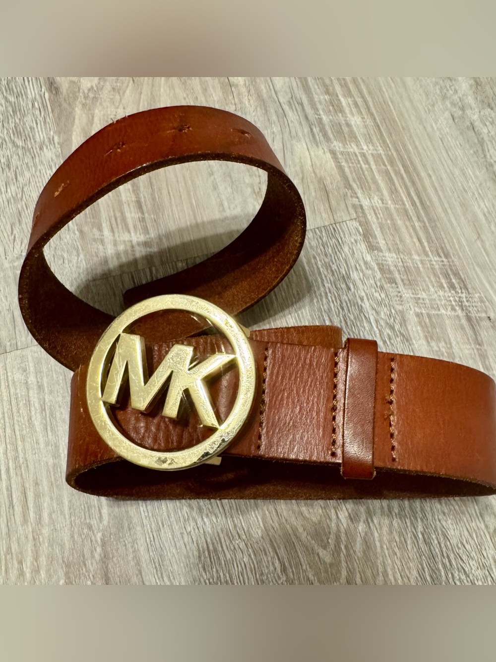 Michael Kors . Women's brown Michael Kors (MK) leather belt, medium size, with a